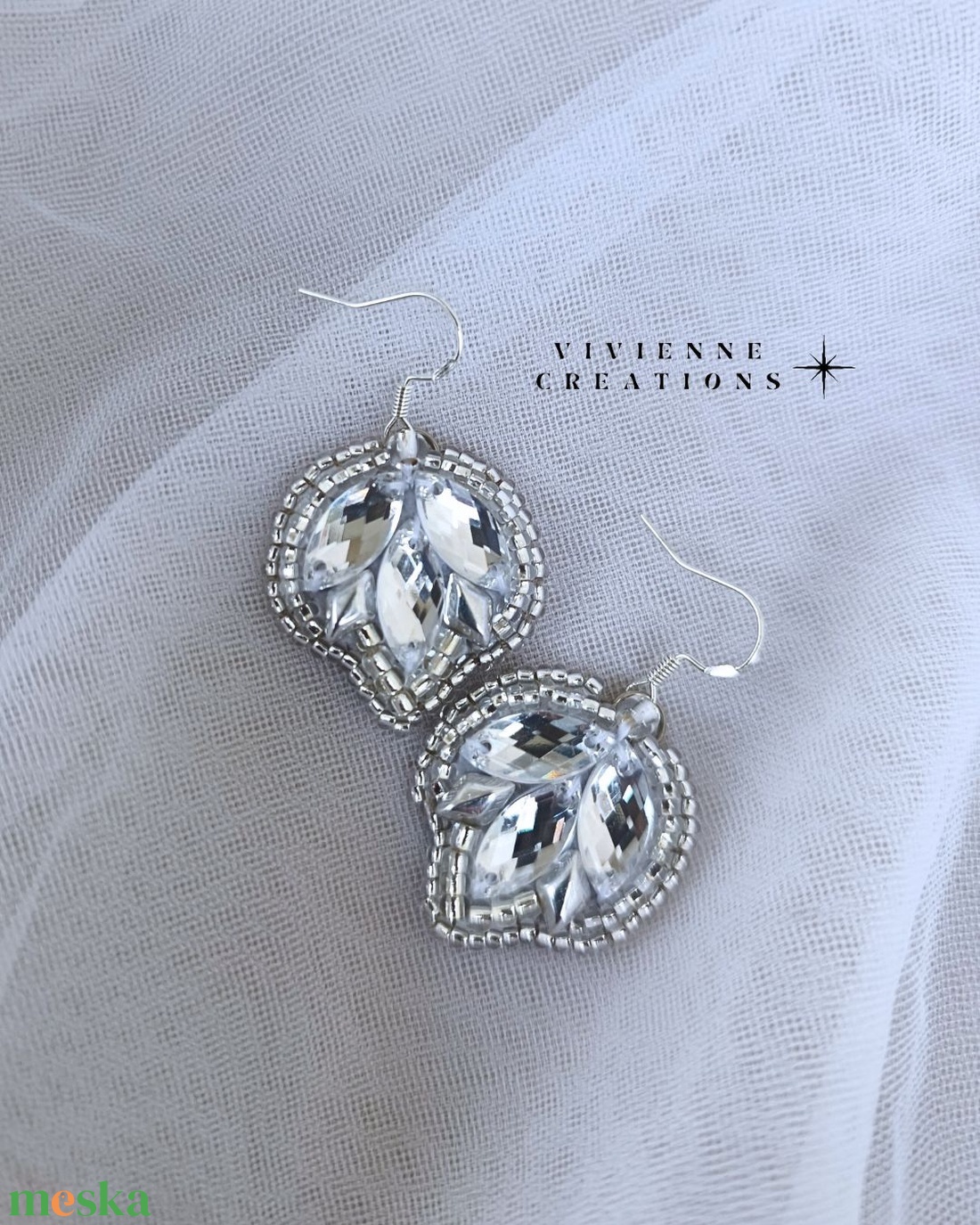 Nyx fülbevaló ezüst színváltozat - ékszer - fülbevaló - lógó fülbevaló - Meska.hu