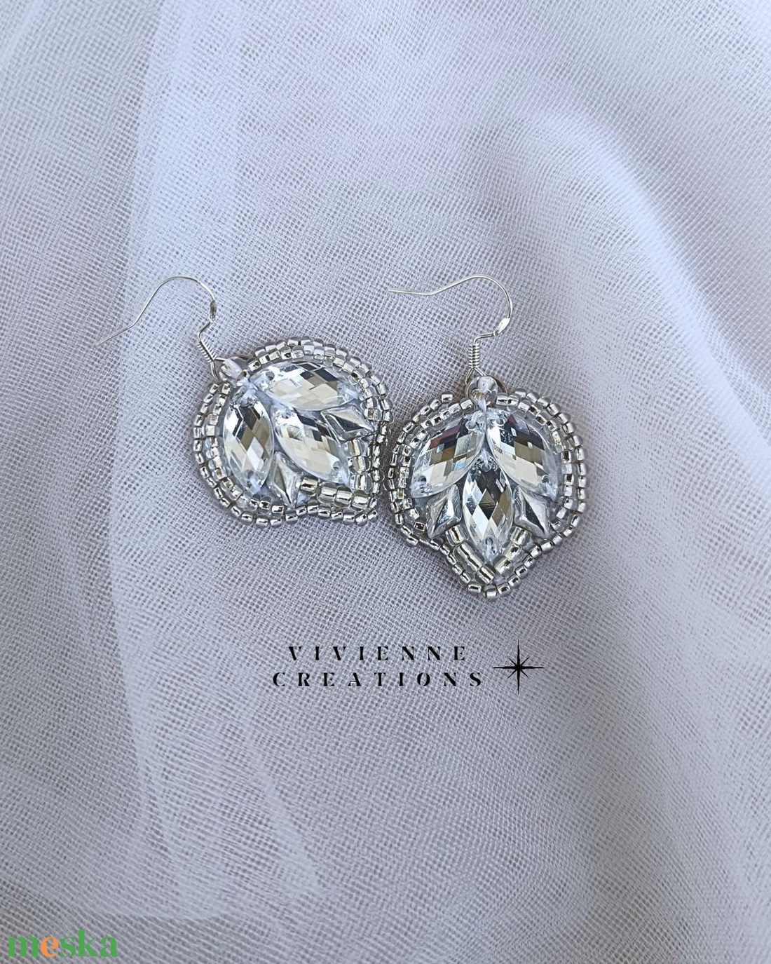 Nyx fülbevaló ezüst színváltozat - ékszer - fülbevaló - lógó fülbevaló - Meska.hu