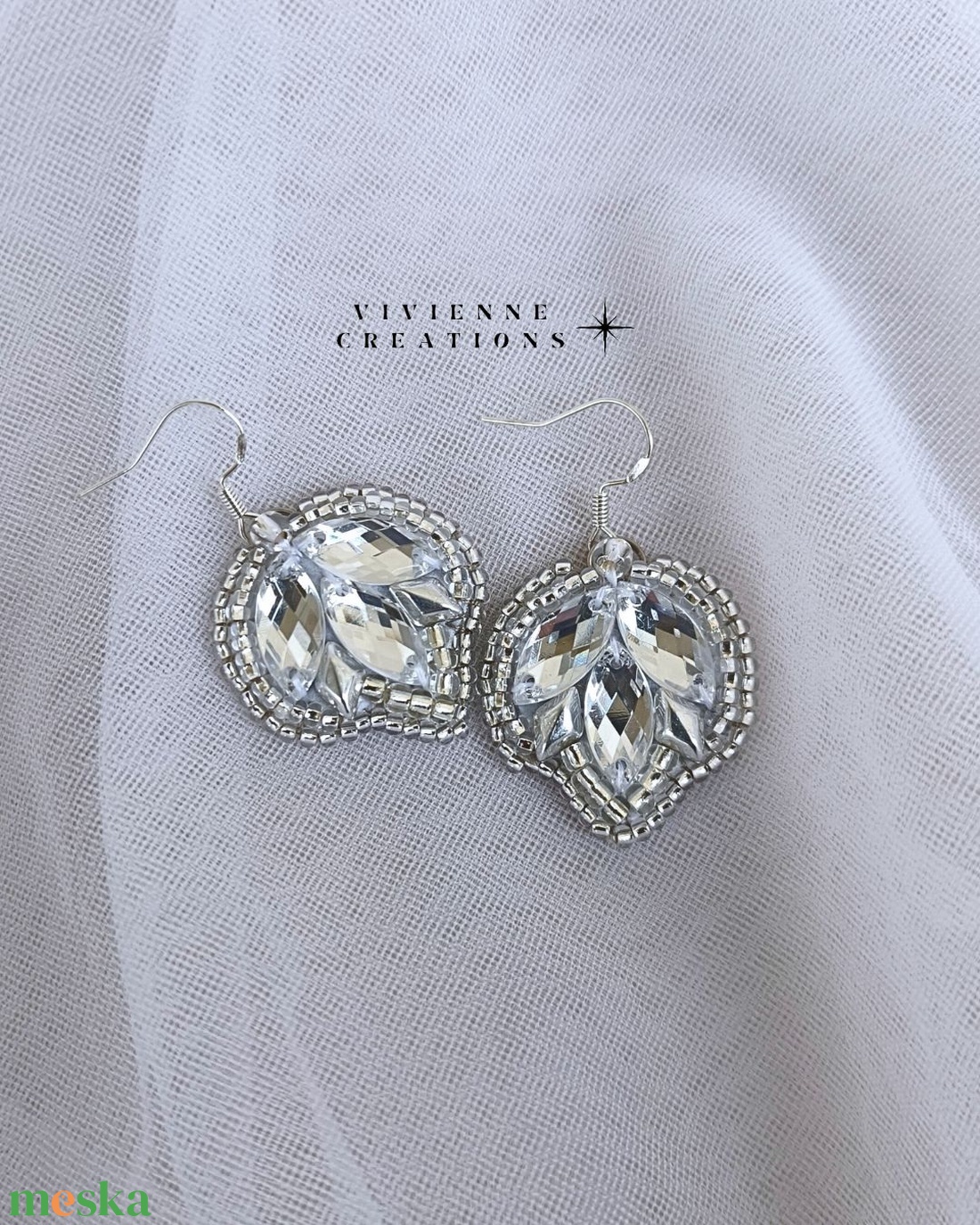 Nyx fülbevaló ezüst színváltozat - ékszer - fülbevaló - lógó fülbevaló - Meska.hu