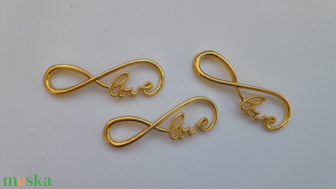 Fém köztes (íves) - 39x13mm - love, végtelen jel - 5 db / csomag - arany szín - kellékek & szerszámok - gyöngyfűzés kellékek - fém köztesek - Meska.hu Fém köztes (íves) - 39x13mm - love, végtelen jel - 5 db / csomag - arany szín - kellékek & szerszámok - gyöngyfűzés kellékek - fém köztesek - Meska.hu