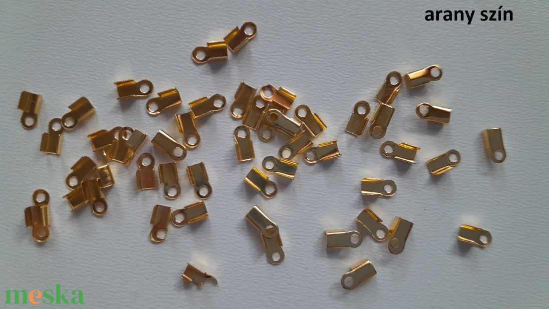 Végzáró - 6x3mm - 50 db / csomag - arany szín - kellékek & szerszámok - gyöngyfűzés kellékek - egyéb alkatrész - Meska.hu Végzáró - 6x3mm - 50 db / csomag - arany szín - kellékek & szerszámok - gyöngyfűzés kellékek - egyéb alkatrész - Meska.hu
