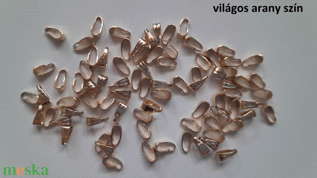 Fém medáltartó - 7 mm - 50 db / csomag - világos arany szín - kellékek & szerszámok - gyöngyfűzés kellékek - egyéb alkatrész - Meska.hu Fém medáltartó - 7 mm - 50 db / csomag - világos arany szín - kellékek & szerszámok - gyöngyfűzés kellékek - egyéb alkatrész - Meska.hu