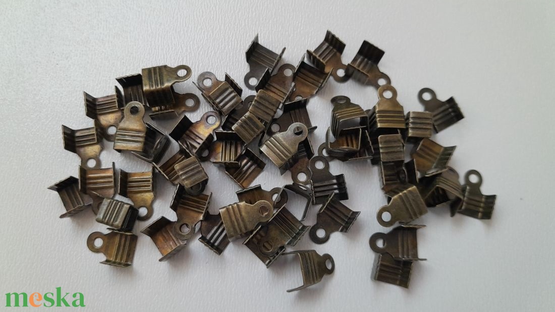 Szalagvég, végzáró - 11x6mm - 50 db / csomag - sárgaréz szín - kellékek & szerszámok - gyöngyfűzés kellékek - egyéb alkatrész - Meska.hu Szalagvég, végzáró - 11x6mm - 50 db / csomag - sárgaréz szín - kellékek & szerszámok - gyöngyfűzés kellékek - egyéb alkatrész - Meska.hu