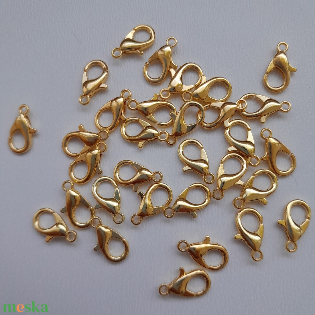 Delfinzár - 12mm - 20 db / csomag - arany szín - kellékek & szerszámok - gyöngyfűzés kellékek - egyéb alkatrész - Meska.hu Delfinzár - 12mm - 20 db / csomag - arany szín - kellékek & szerszámok - gyöngyfűzés kellékek - egyéb alkatrész - Meska.hu
