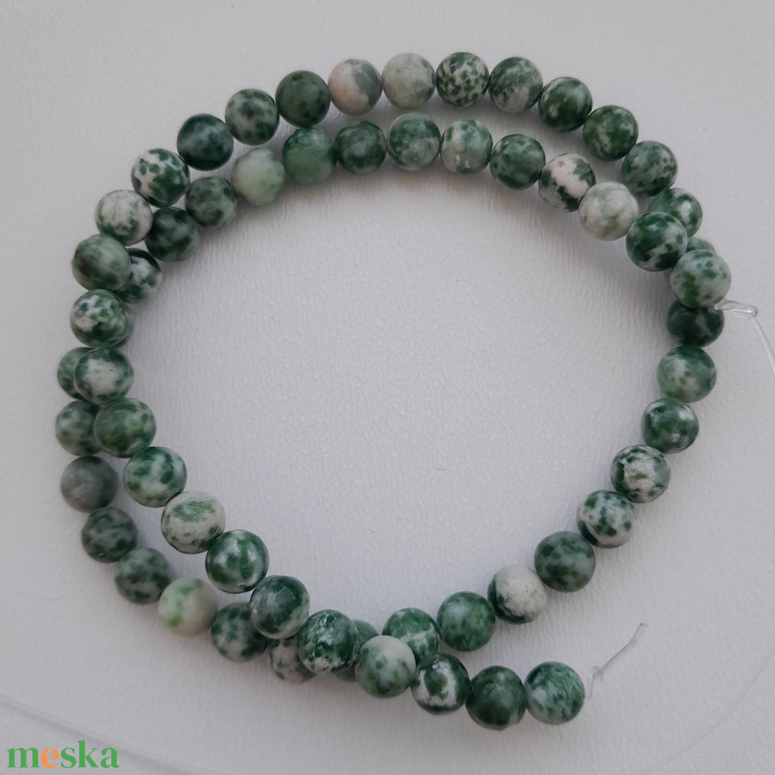 Jade zöld pettyes szál - 6mm (59db / szál) - kellékek & szerszámok - ásvány alapanyag - ásványfüzér - Meska.hu Jade zöld pettyes szál - 6mm (59db / szál) - kellékek & szerszámok - ásvány alapanyag - ásványfüzér - Meska.hu
