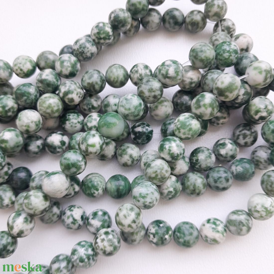 Jade zöld pettyes szál - 8mm (44db / szál) - kellékek & szerszámok - ásvány alapanyag - ásványfüzér - Meska.hu Jade zöld pettyes szál - 8mm (44db / szál) - kellékek & szerszámok - ásvány alapanyag - ásványfüzér - Meska.hu