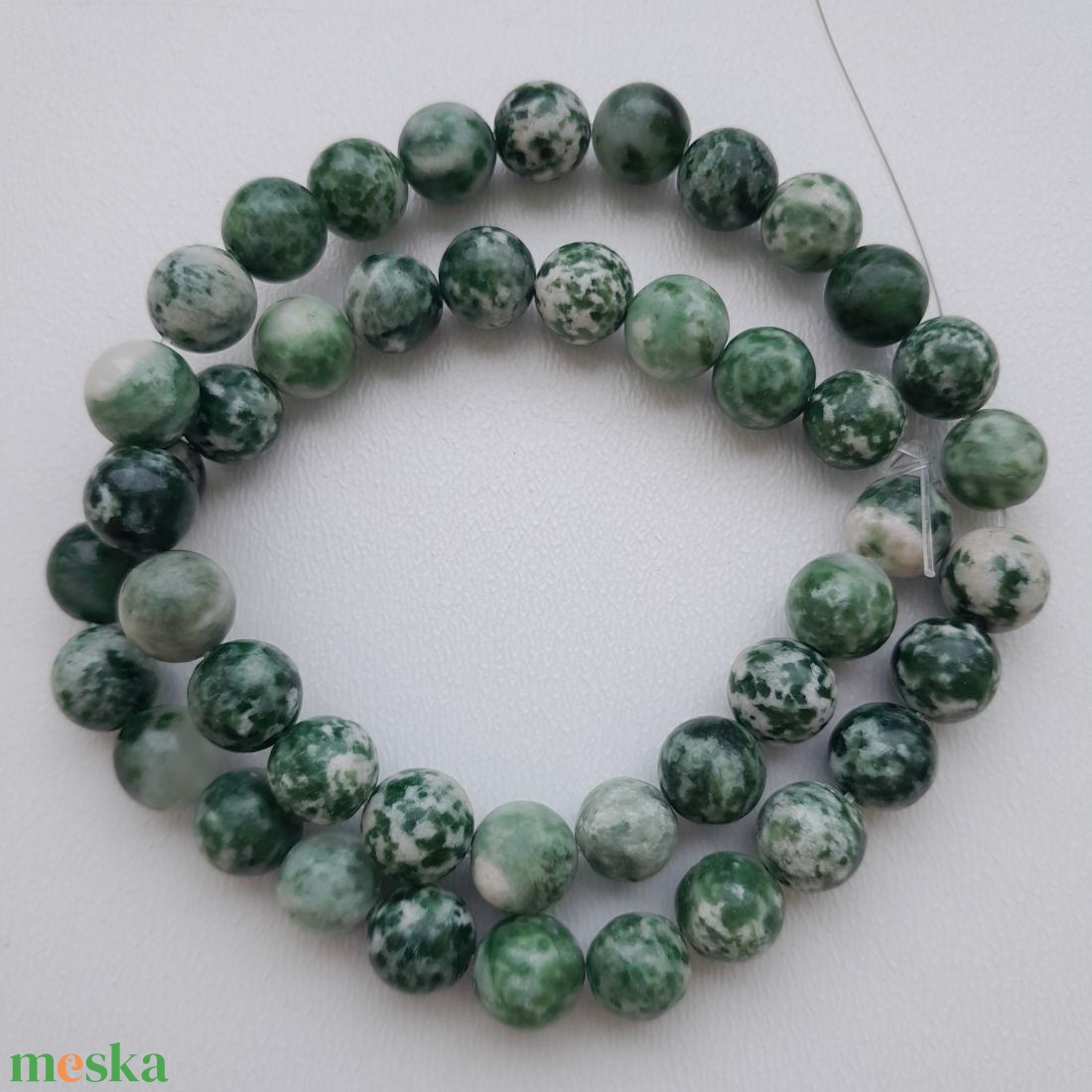 Jade zöld pettyes szál - 8mm (44db / szál) - kellékek & szerszámok - ásvány alapanyag - ásványfüzér - Meska.hu Jade zöld pettyes szál - 8mm (44db / szál) - kellékek & szerszámok - ásvány alapanyag - ásványfüzér - Meska.hu