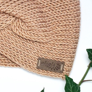 Bézs kötött fülpánt / csavart fülmelegítő / fülvédő - ruha & divat - sál, sapka, kendő - fejpánt - Meska.hu