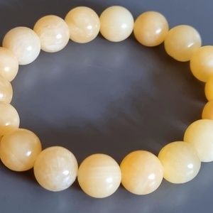 Narancs kalcit karkötő, elegáns, drágakő, ásvány, ajándék, nőnek, Ékszer, Karkötő, Gyöngyös karkötő, Ékszerkészítés, MESKA