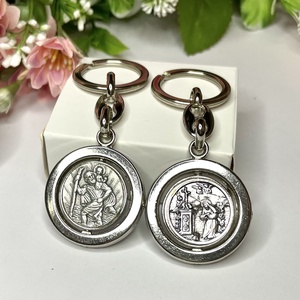 Szent Kristóf és Szent Rita forgós kulcstartó amulett - Meska.hu