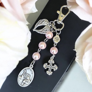 Szent Rita védelmező amulett kulcstartó táskadísz rózsaszín 5598402 - Meska.hu