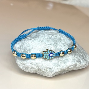 Csomózott makramé állítható méretű védelmező Hamsa kéz karkötő arany színű hematit gyöngyökkel kék 5676075 - ékszer - karkötő - fonott karkötő - Meska.hu