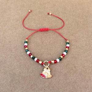 Karácsonyi csengettyű csomózott makramé charm karkötő 5666532 - ékszer - karkötő - fonott karkötő - Meska.hu