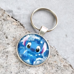 Üveglencsés fém kulcstartó - Stitch - Meska.hu