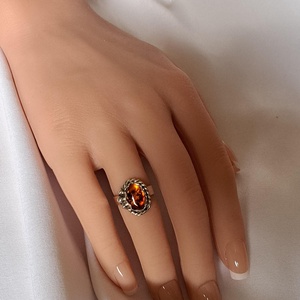 Borostyán ovális gyűrű csavartan - Meska.hu