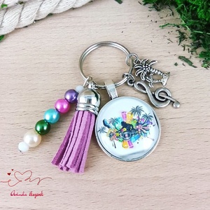 Fesztivál mintás üveglencsés kulcstartó lila bojttal � zenekedvelőknek ajándék - Meska.hu