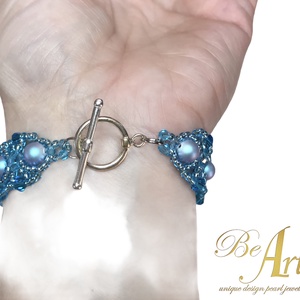 Swarovski gyöngy karkötő Light Blue Iridescent nikkelmentes - ékszer - karkötő - Meska.hu