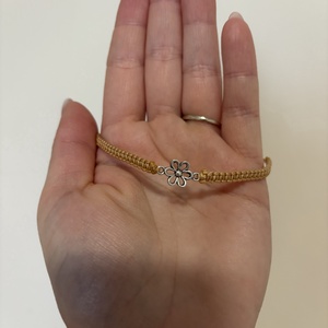 Virágos makramé karkötő - ékszer - karkötő - fonott karkötő - Meska.hu