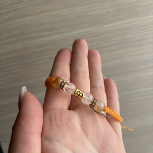 Makramé karkötő - kos medállal - ékszer - karkötő - fonott karkötő - Meska.hu