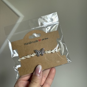 Spirálcsomós pillangós karkötő - ékszer - karkötő - fonott karkötő - Meska.hu