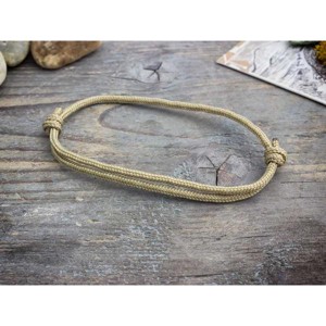 Gondoskodás barna paracord karkötő - ékszer - karkötő - fonott karkötő - Meska.hu