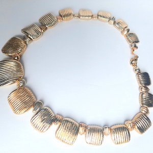 Arany nyakék recés lapokból, galvanizált - ékszer - nyaklánc - statement nyaklánc - Meska.hu