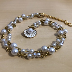 UnderTheSea G05, Ékszer, Nyaklánc, Medálos nyaklánc, Ékszerkészítés, Gyöngyfűzés, gyöngyhímzés, 4 és 6 mm-es fehér és áttetsző gyöngyökből készült arany színű ékszerdróttal. 
1,5 cm-es arany-fehé..., MESKA