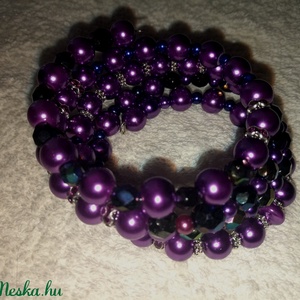 Különböző lila gyöngyökből készült memória drótra fűzött négy soros karkötő eladó - ékszer - karkötő - memóriadrótos karkötő - Meska.hu