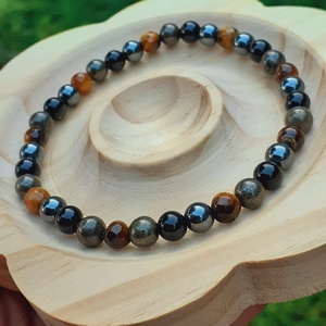 Bőség erejével karkötő pirittel, ónixszal, tigrisszemmel és hematittal, unisex ékszer  - ékszer - karkötő - bogyós karkötő - Meska.hu