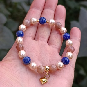 Lapis lazuli, barack holdkő és kagyló ásványkarkötő szív medállal, Ékszer, Karkötő, Ásványkarkötő, Ékszerkészítés, MESKA