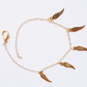 Angyal szárny sor medálos arany színű bokalánc - ékszer - lábdísz és testékszer - bokalánc - Meska.hu Angyal szárny sor medálos arany színű bokalánc - ékszer - lábdísz és testékszer - bokalánc - Meska.hu