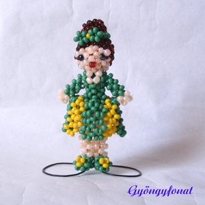 Lány csíkos szoknyában gyöngyből, kabalafigura - Meska.hu