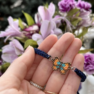 Fonott karkötő bronzszínű-narancssárga gyöngy pillangóval - ékszer - karkötő - fonott karkötő - Meska.hu