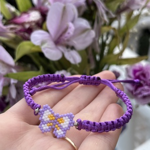 Fonott karkötő bronzszínű-világoslila gyöngy pillangóval - ékszer - karkötő - fonott karkötő - Meska.hu