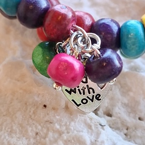 108 szemes tekercselt karkötő � színes boho fókuszékszer - ékszer - karkötő - memóriadrótos karkötő - Meska.hu