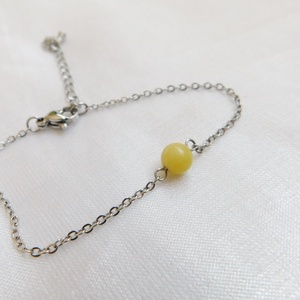 Acél karkötő kalcit gyönggyel - Meska.hu