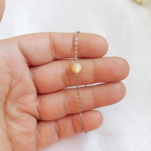 Gyöngyház karkötő - ékszer - karkötő - karkötő medállal - Meska.hu