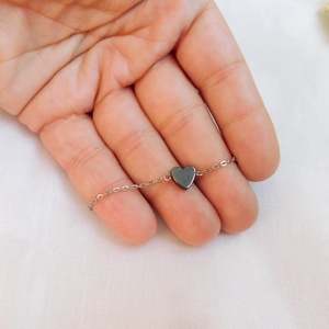 Acél karkötő hematittal - ékszer - nyaklánc - medál - Meska.hu
