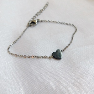 Acél karkötő hematittal - ékszer - nyaklánc - medál - Meska.hu