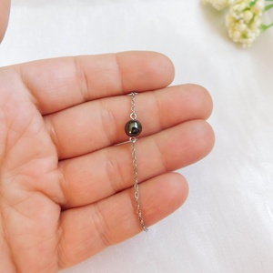 Acél karkötő hematittal - ékszer - nyaklánc - medál - Meska.hu