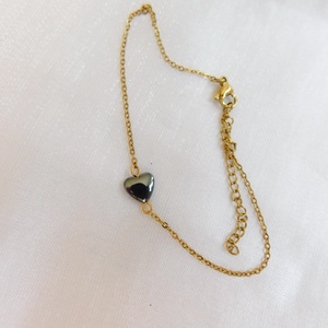 Acél karkötő hematittal - ékszer - nyaklánc - medál - Meska.hu