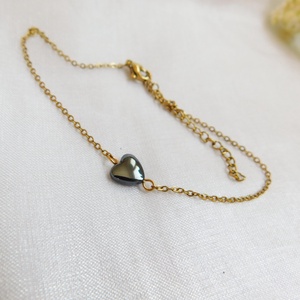 Acél karkötő hematittal - ékszer - nyaklánc - medál - Meska.hu