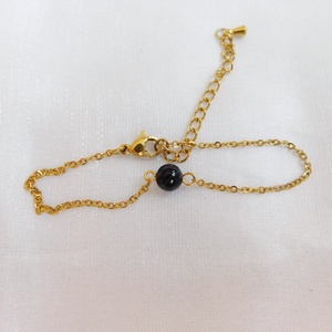 Ónix karkötő - ékszer - karkötő - karkötő medállal - Meska.hu