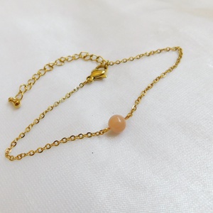 Aranyozott acél karkötő napkővel - ékszer - nyaklánc - medál - Meska.hu