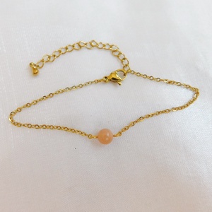 Aranyozott acél karkötő napkővel - ékszer - nyaklánc - medál - Meska.hu