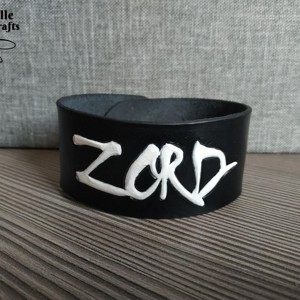 Zord feliratú karpánt, Ékszer, Karkötő, Széles karkötő, , MESKA