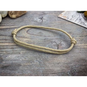 Gondoskodás barna paracord karkötő - ékszer - karkötő - fonott karkötő - Meska.hu