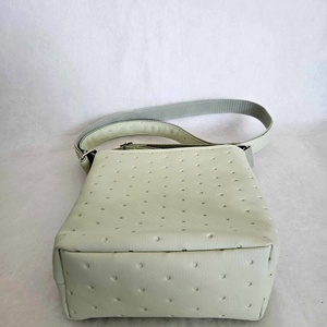 Halványzöld steppelt oldaltáska pöttyös béléssel - táska & tok - kézitáska & válltáska - vállon átvethető táska - Meska.hu