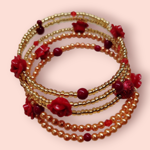 Piros rózsás memoria karkötő  - ékszer - karkötő - memóriadrótos karkötő - Meska.hu