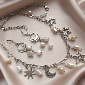 Égi Ragyogás szett: Nemesacél nyaklánc és fülbevaló valódi gyöngyökkel és selymesen csillogó üvegkristályokkal - Meska.hu